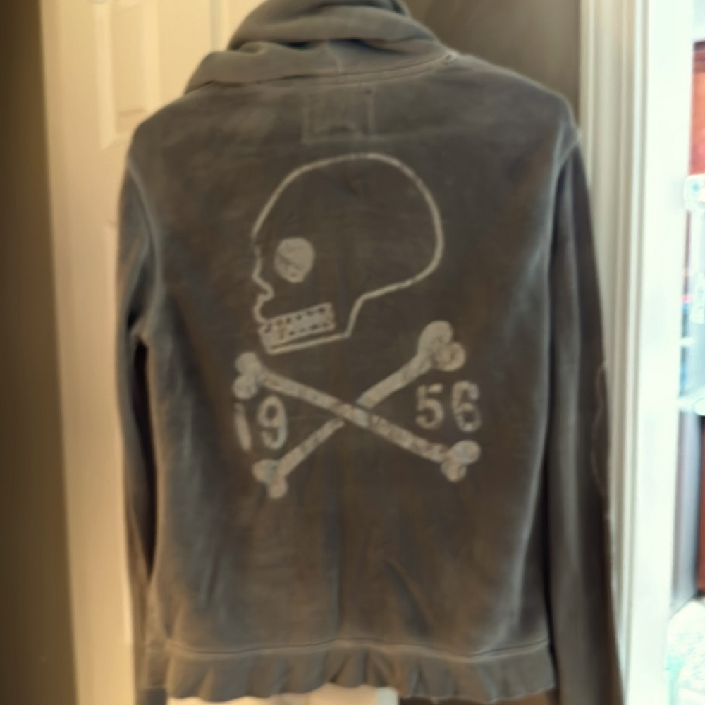 True Religion distressed zip up hoodie with 1956 skull and crossbones on back
